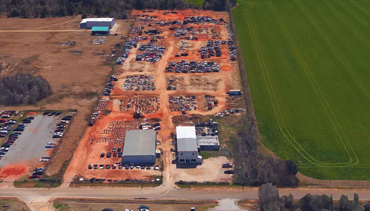 Aerial view of Baldwin Auto Salvage at 18276 Couch Plant Rd, Summerdale, AL 36580