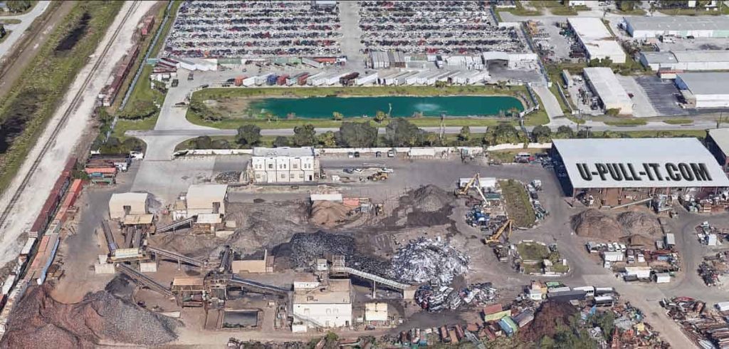 How do scrap yards make money?