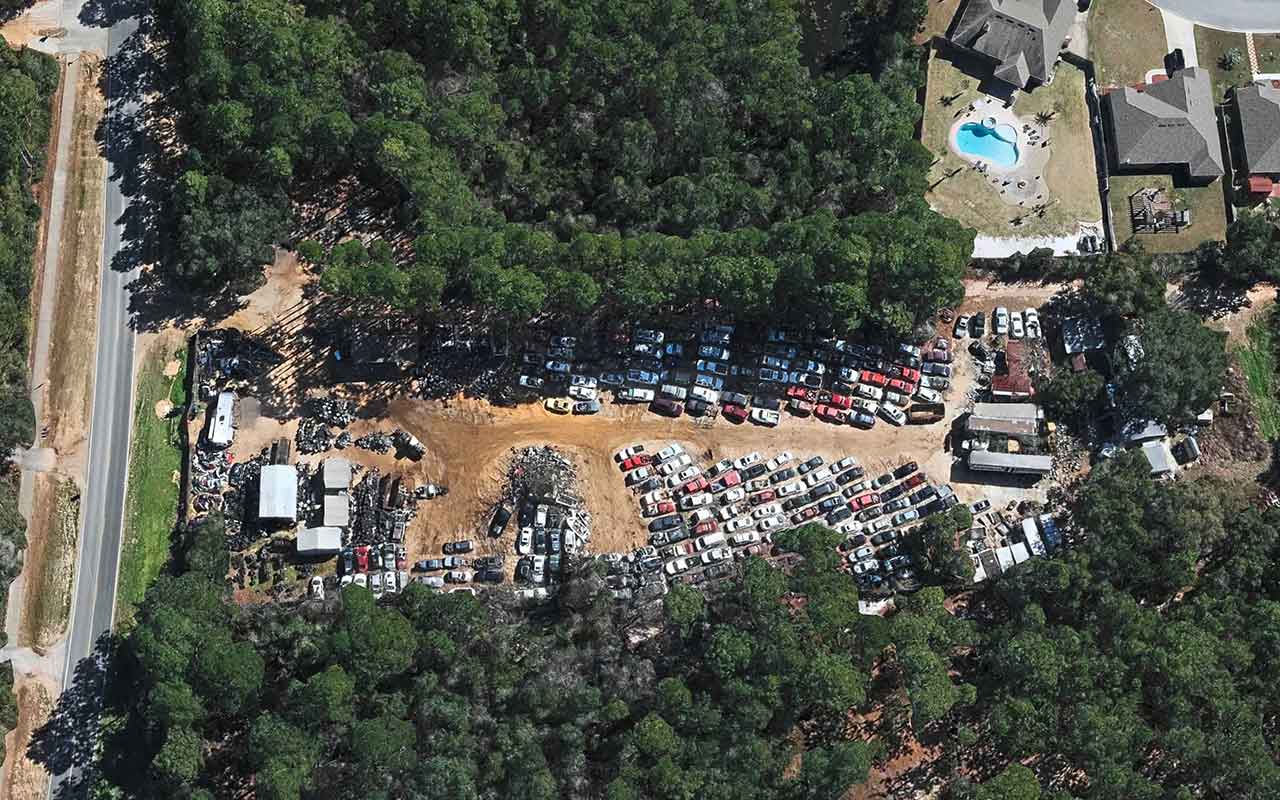 Aerial view of R & R Auto Salvage at 7501 E Bay Blvd, Navarre, FL 32566