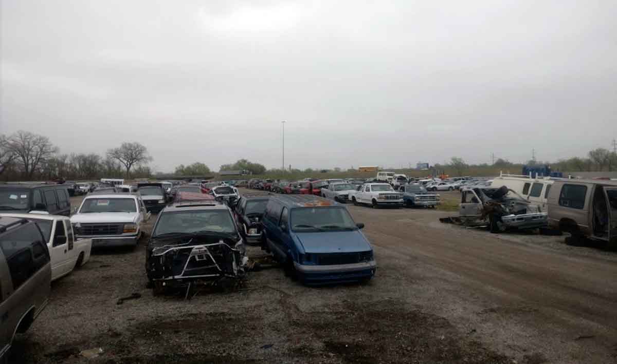 Junk cars at Chrisman's Truck-Auto Salvage Yard at 3852 S Broadway, Wichita, KS 67216