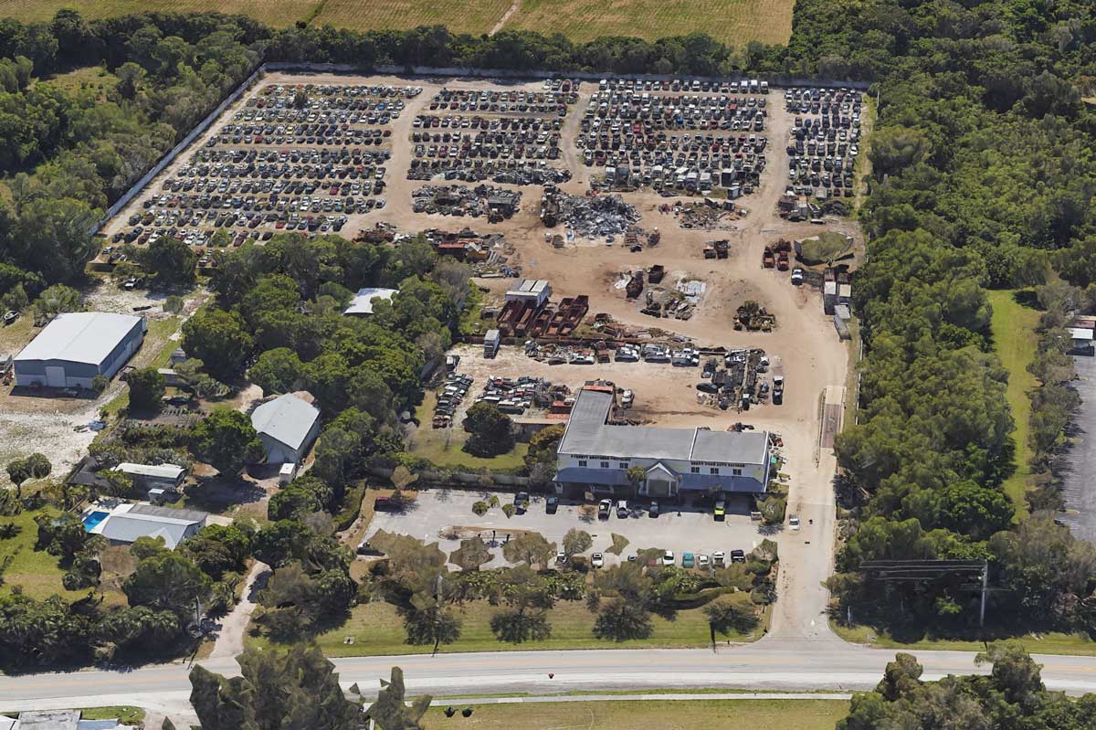 Aerial view of Snake Road Auto Salvage at 1650 SE Salerno Rd, Stuart, FL 34997