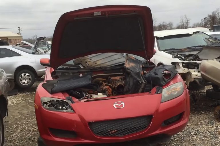 Find used car hoods at the local junkyard