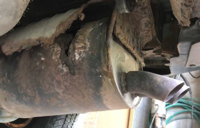 Replace a cracked or rusted muffler with a junkyard one