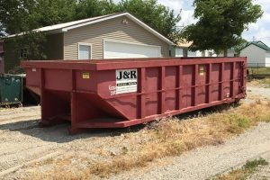 J R Sanitation LLC at 303 Hickory St Garrison IA 52229 2 300x200