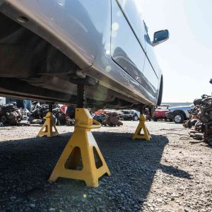 The Anatomy of a Junkyard: Why Are All the Cars on Wheel Rims?